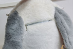 Can a plush shoulder bag hold a laptop?